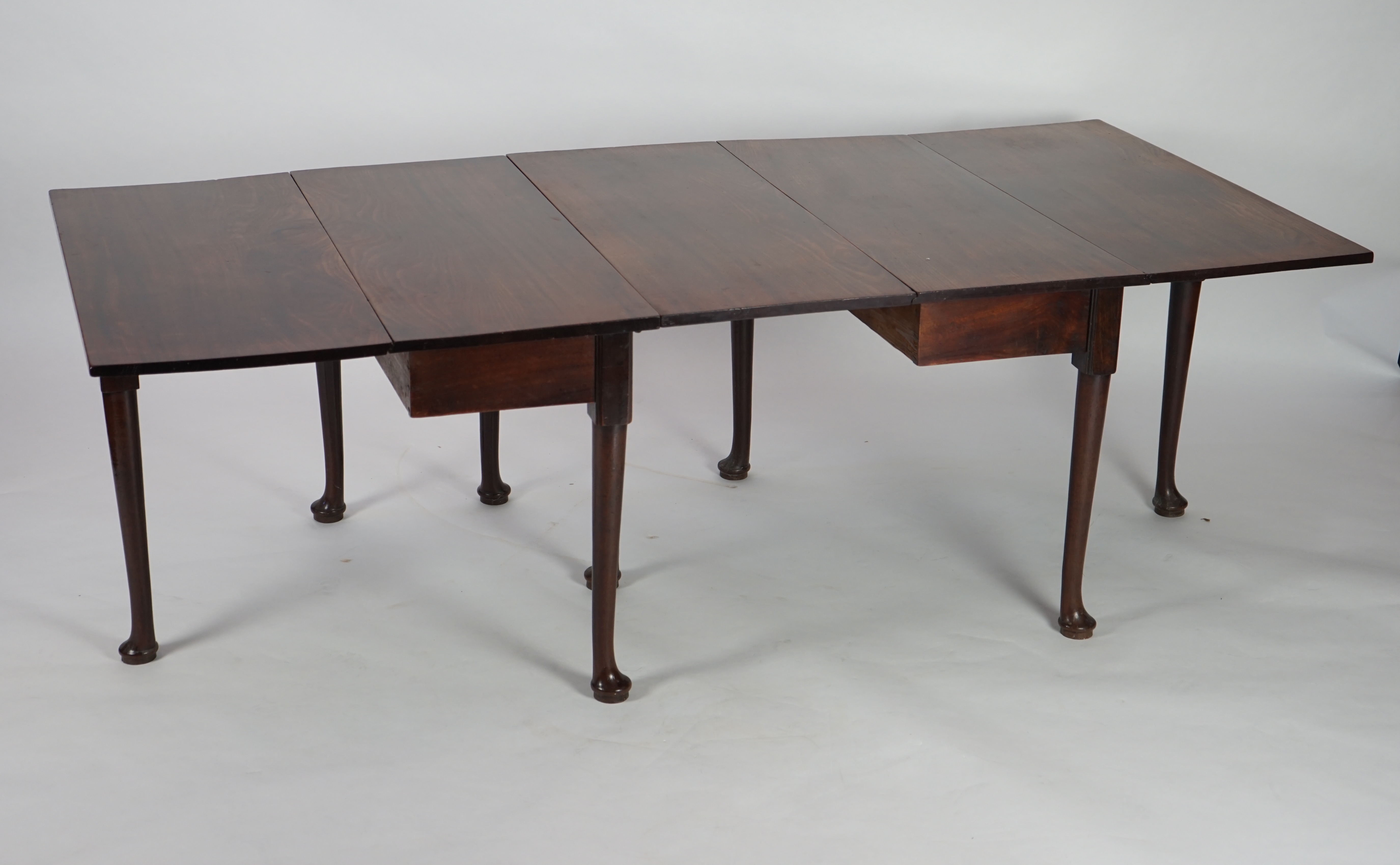 A George II mahogany double drop leaf dining table